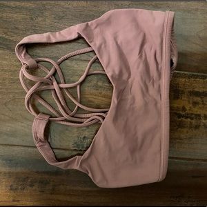 Pink Lululemon sports bra